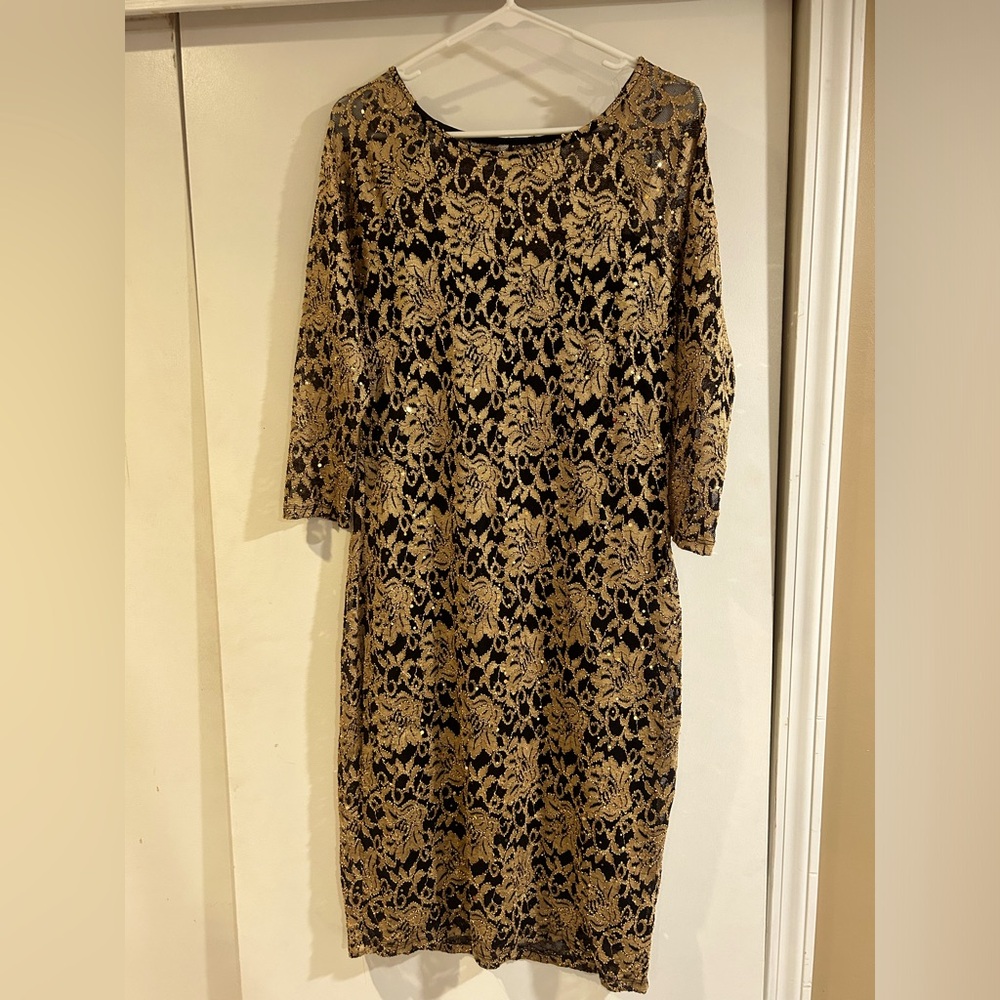 Beautiful gold leaf with black background, knee length dress